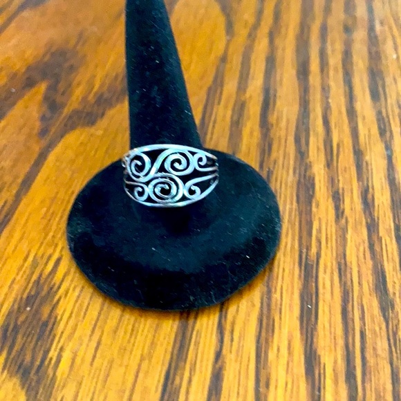 2 for $12. A silver design ring in size 8 - Picture 2 of 5